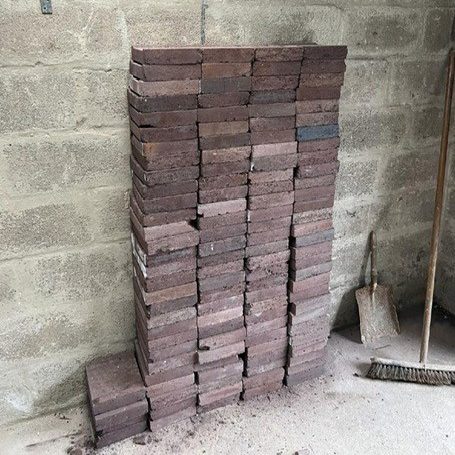 Old storage bricks stacked up ready for collection and reuse